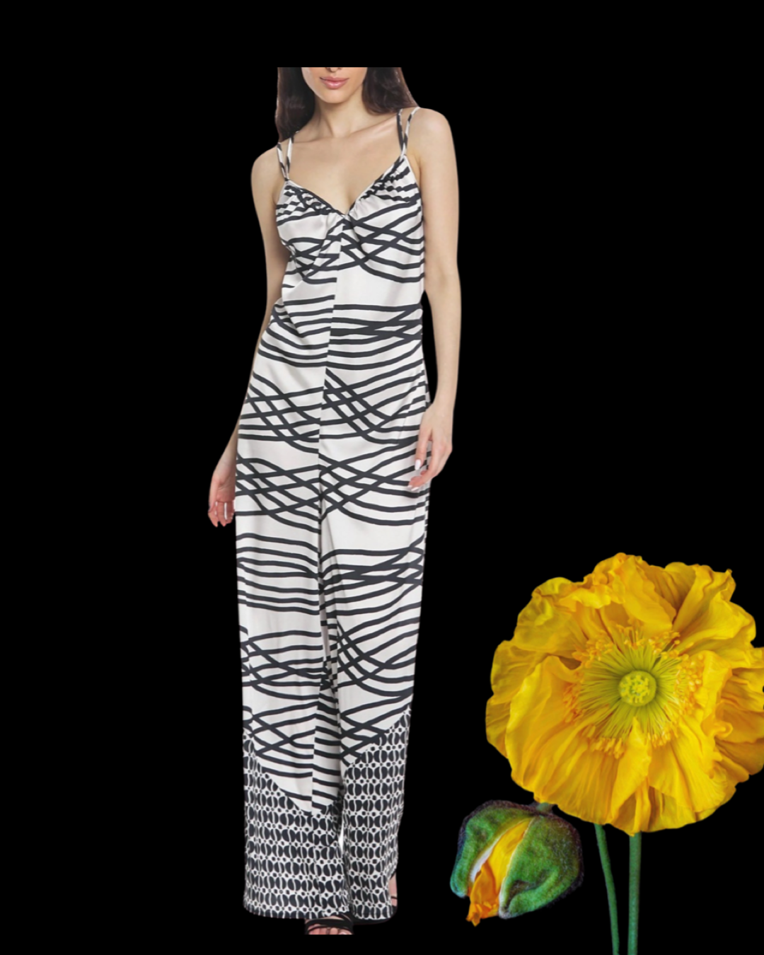 Tuta Monochrome "Floral Jumpsuit" con spalline sottili e una vestibilità morbida, bianca e nera.